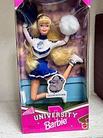 Front view of sealed Barbie doll in original University Barbie box