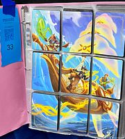 binder open showing 9-card puzzle artwork