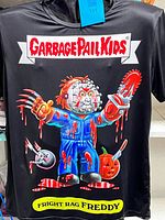 Full front view of black Garbage Pail Kids Fright Rag Freddy graphic T-shirt