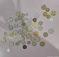 overview of assorted coins spread out
