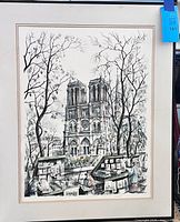 Full view of framed print showing Notre Dame scene