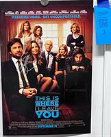 Front view of full poster showing artwork, signature, tagline, release info