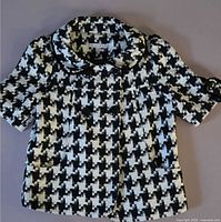 Front view of Joy*Joy houndstooth blazer showing pattern, buttons, collar