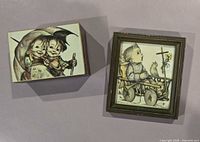 Music box and framed print side by side