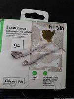 Front of Belkin BoostCharge box showing product photo, length 9.8 ft, Lightning to USB-A details