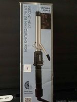 Front view of boxed Conair Instant Heat 3/4 in curling iron