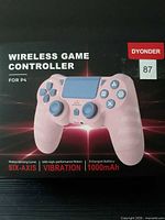 Front of retail box showing Dyonder wireless game controller image and feature callouts