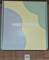 Closed retail box labelled HAIR CLIPPER