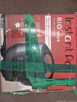 Retail box showing Instant Pot RIO Wide multi cooker branding