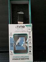 Front of box with monitor visible in foam insert