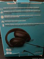 Back panel of box listing specifications: 40 mm drivers, braided cable, in-line mic