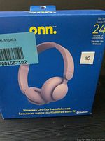 Front of boxed onn. wireless on-ear headphones