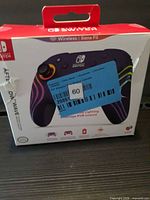 Front of boxed Afterglow Wave controller showing product image and Nintendo Switch compatibility