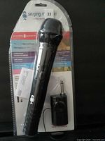 Front view of sealed package showing microphone and receiver