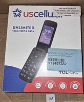 Front of sealed TCL Flip Go retail box showing phone image and UScellular branding