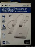Front of box showing Vivitar Elite Mobile SD & Micro SD universal card reader and cables