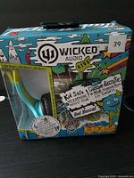 Front of retail box showing Wicked Audio Kids Rad Rascal headphones