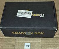 Closed box marked Smart TV Box