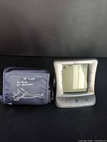 Front view of BIOS blood pressure monitor with cuff