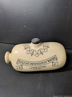 Side view showing maker's mark and decoration