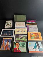 Overview of all twelve postcard items laid out