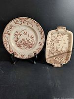 Overall view of plate and tray showing design and shapes