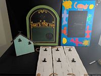 All six plaques arranged together for scale and overview