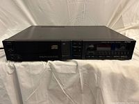 Front and top view of Alpine AD-7200 unit