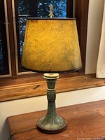 Full view of lamp showing base, shade, cord