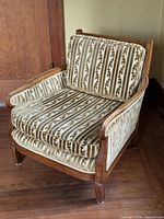 Front view of walnut Louis XVI style upholstered chair