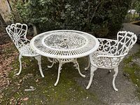 Full view of round table with two chairs