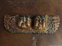 Front view of entire double cherub wooden plaque