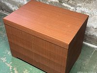 Closed chest showing veneer exterior