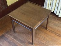 Full view of square walnut side table