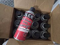 Open box showing 12 cans, one can displayed label outward