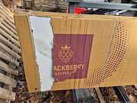 Box showing Blackberry Tiles Pvt Ltd logo