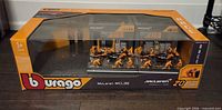 Front of boxed Bburago McLaren MCL38 pit stop set