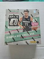 Front of sealed 2020-21 Panini Donruss Optic Mega Box displaying Luka Dončić and 40-card callout