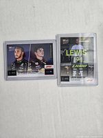 Fronts of both Topps Now cards in holders