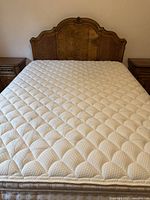 Full view of mattress on bed frame