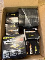 Box containing six Philips light-bulb boxes