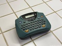 Front view showing keyboard, LCD and overall condition of PT-65