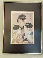 Full view of framed print showing image, mats and metal frame