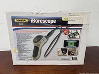 Back of retail box showing product image and specifications