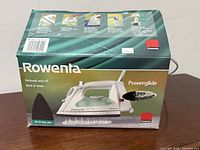 Front of Rowenta Powerglide iron box showing product image and features