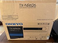 Original Onkyo TX-NR626 packaging showing model and product line