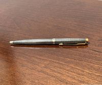 Full view of Parker sterling silver ballpoint pen on table