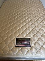 Top view of Simmons Beautyrest Original Royalty Extra Firm queen mattress showing quilted surface
