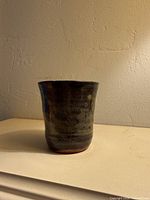 front view of glazed ceramic cup