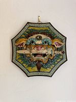 Front view showing full Foo Dog relief and border